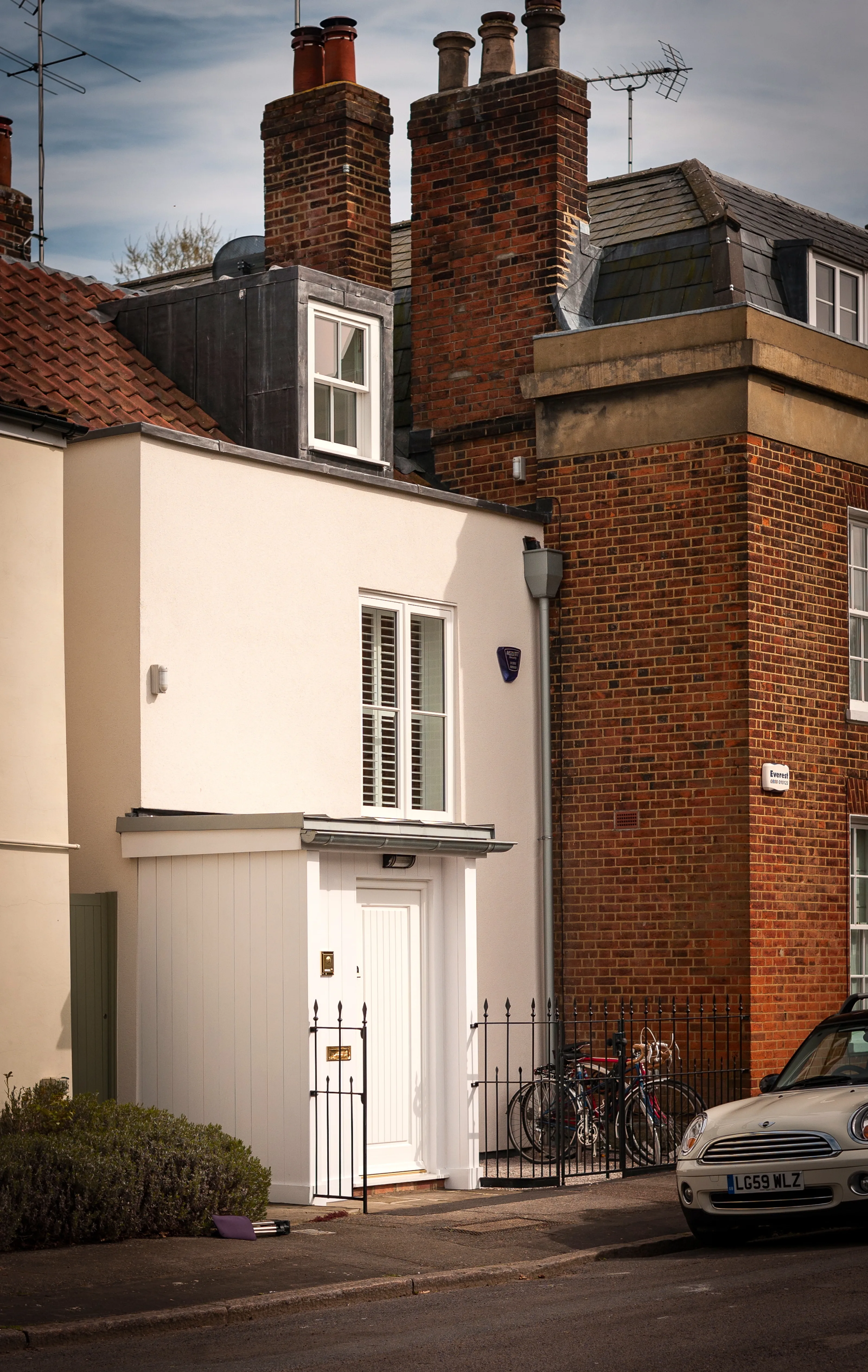 Front elevation of Thames Ditton House 04 following restoration, showing the redesigned façade, new dormer extension and conservation-led improvements