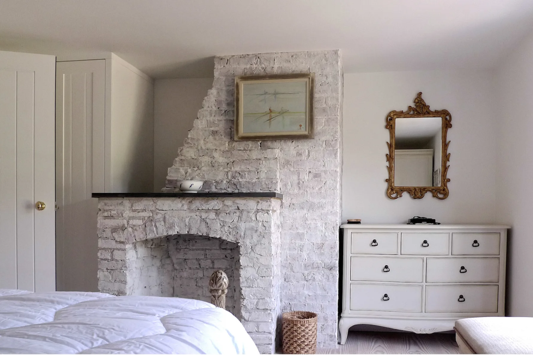 Refurbished bedroom at Thames Ditton House 04 showcasing retained historic character alongside contemporary interior detailing