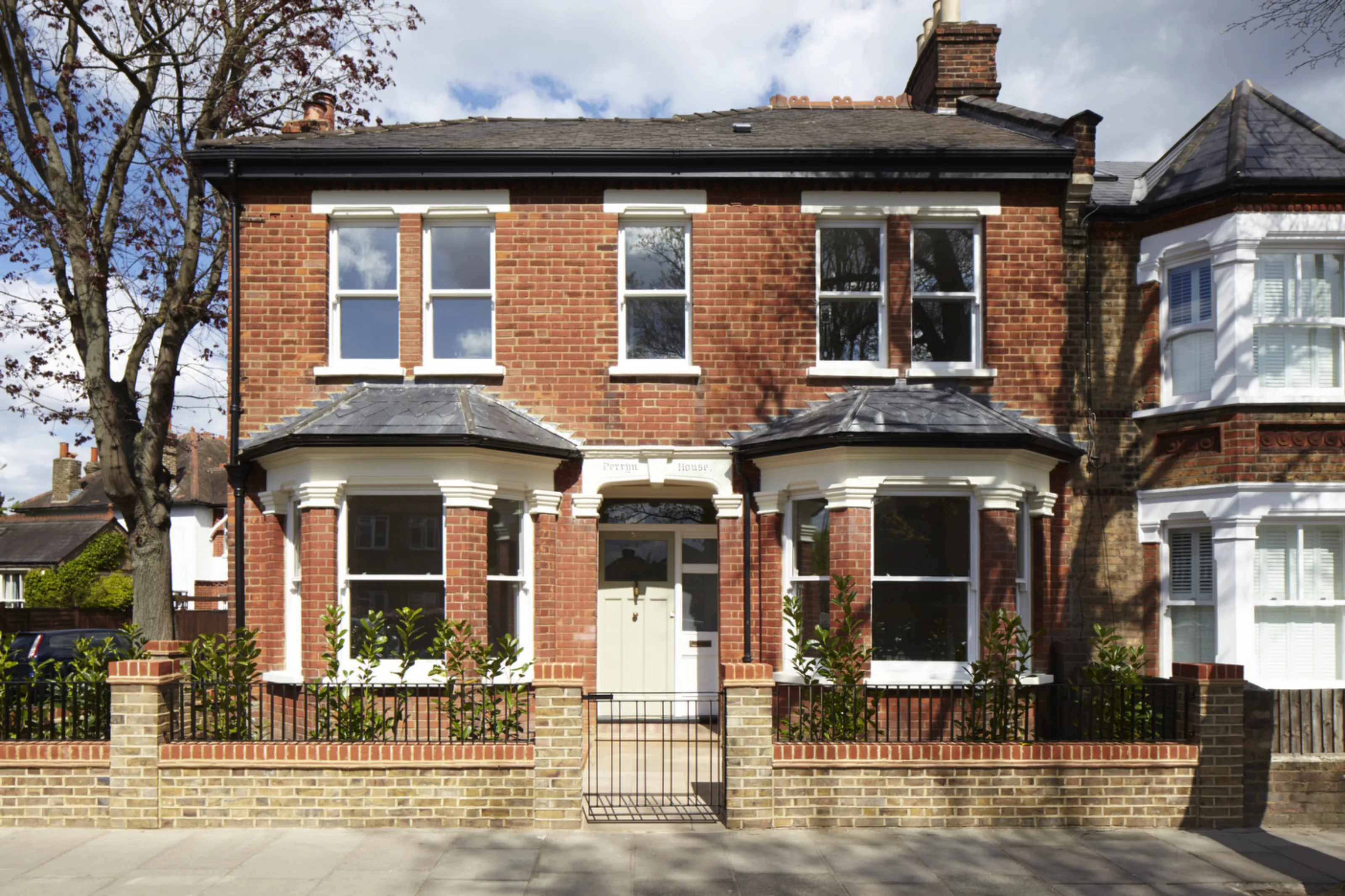 Front elevation of Twickenham House, a refurbished Victorian property in Twickenham with restored brick façade and bay windows.