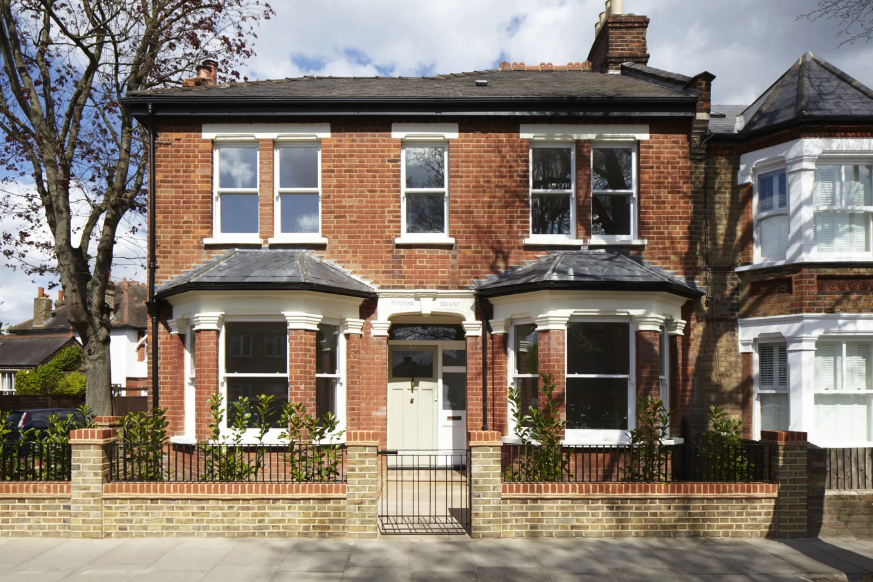 Front elevation of Twickenham House, a refurbished Victorian property in Twickenham with restored brick façade and bay windows.