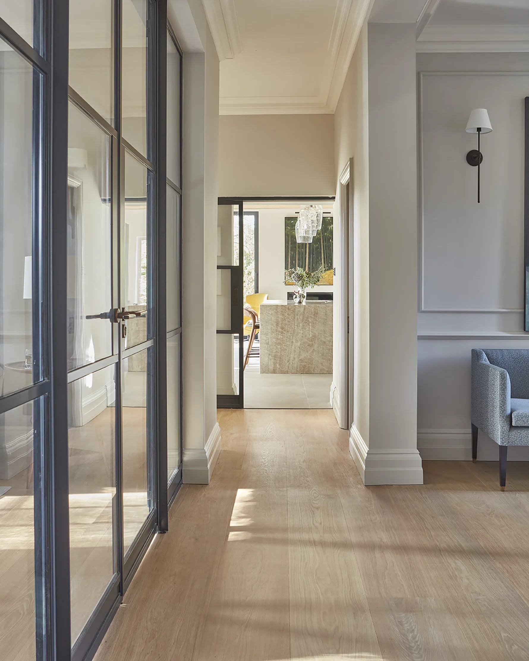 Enfilade view through the restored Edwardian house towards the contemporary kitchen extension at Westerham House.