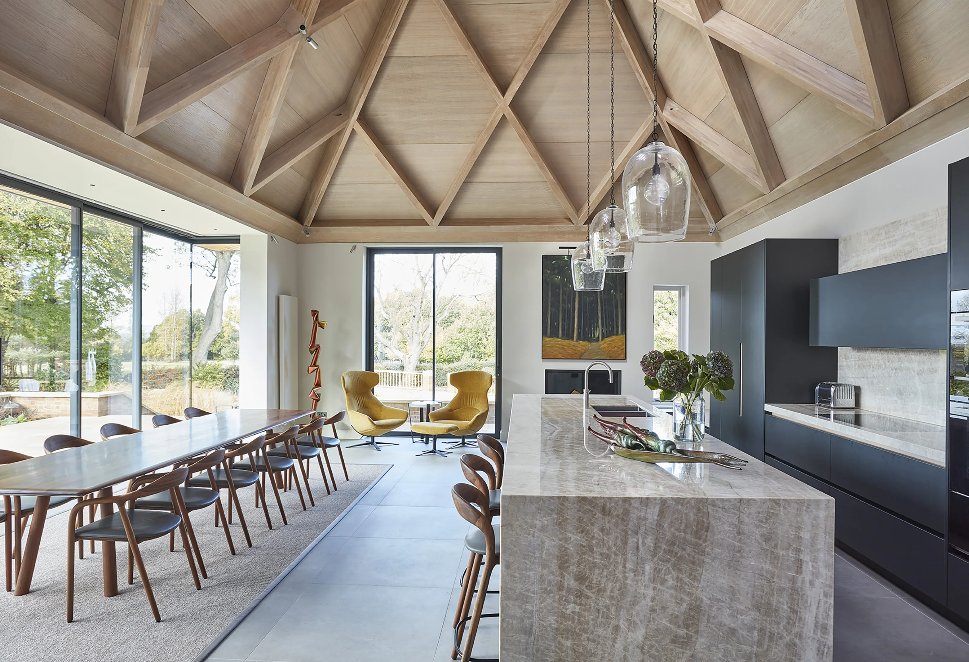 Bespoke contemporary kitchen and dining space within renovated Edwardian home by Phillips Tracey Architects